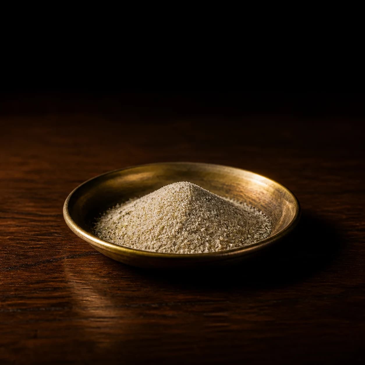 Fine celery salt in a small glass dish
