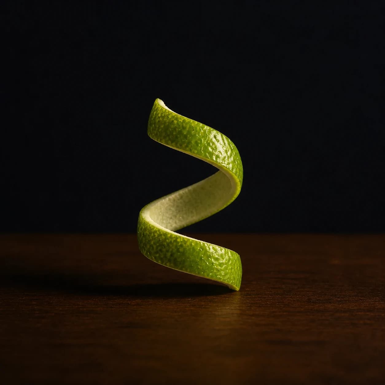 Fresh strip of green lime peel