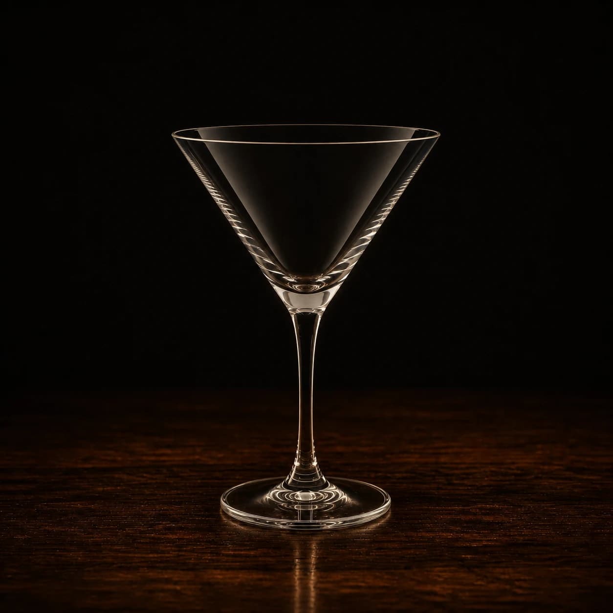Empty clear V-shaped Martini glass