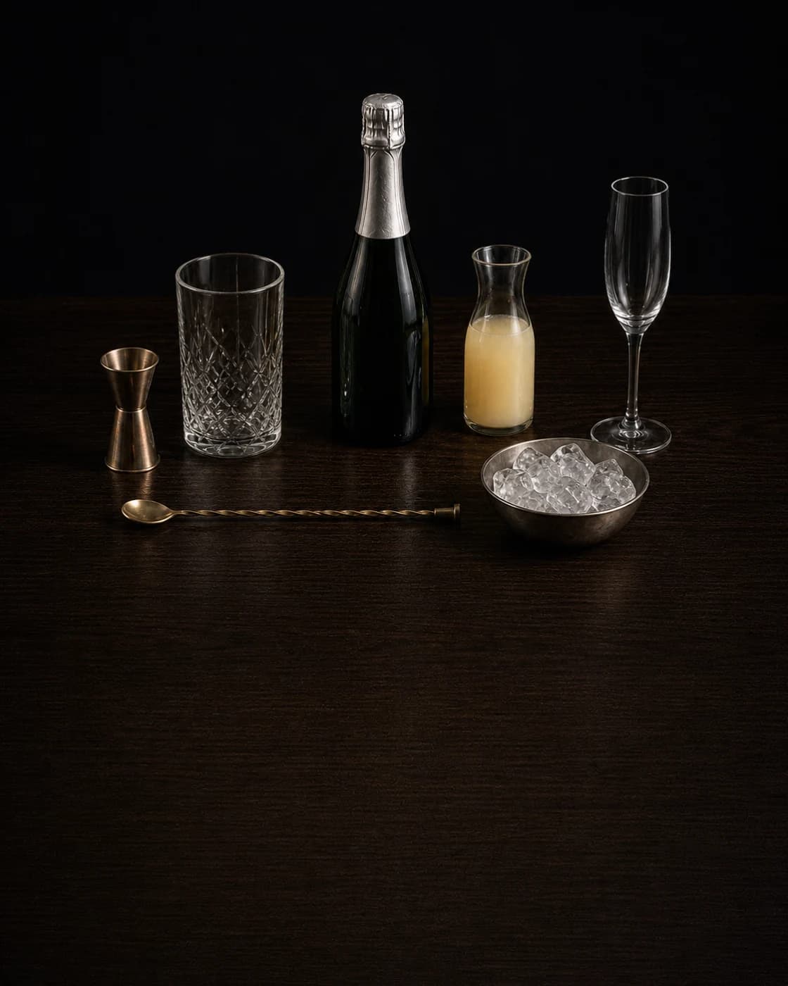 Overhead Bellini station arranged on a dark walnut bar