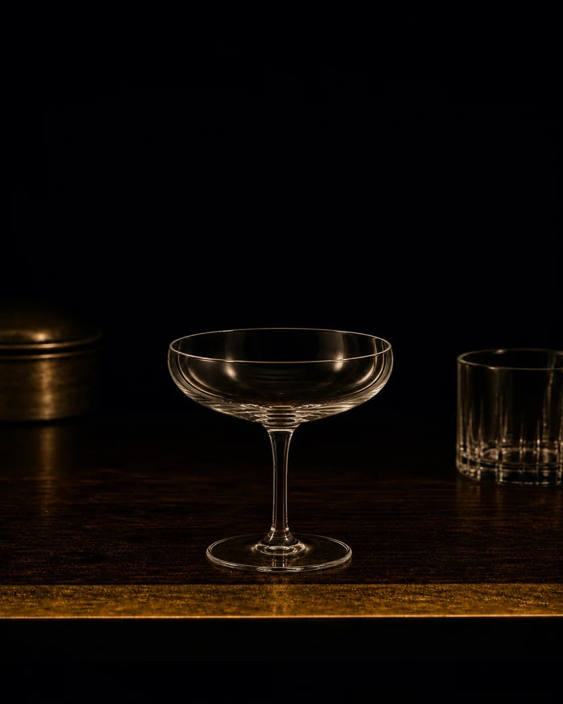 Fine strain stage with cocktail shaker fitted with a fine strainer