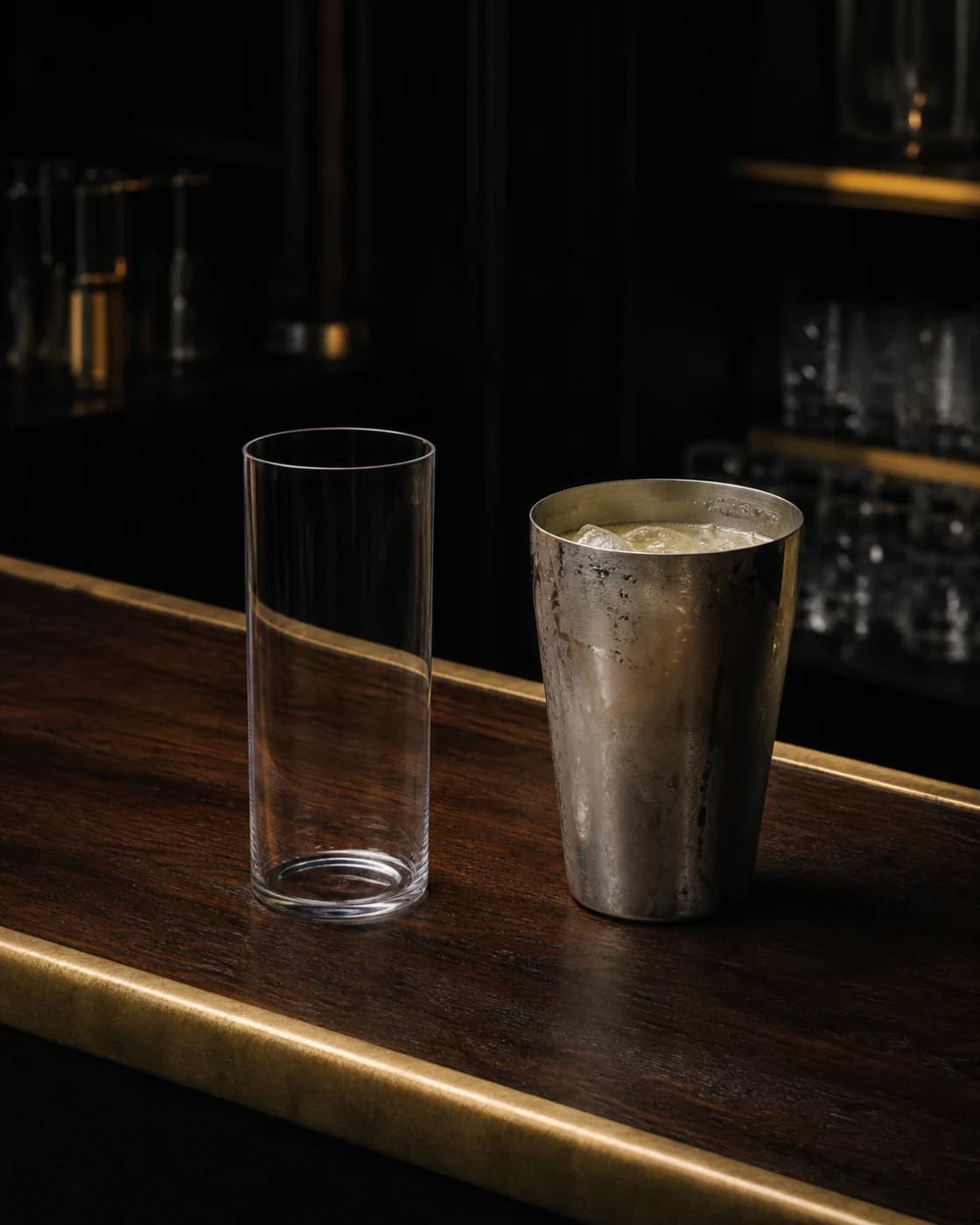 Strain without ice stage with cocktail shaker fitted with a fine strainer