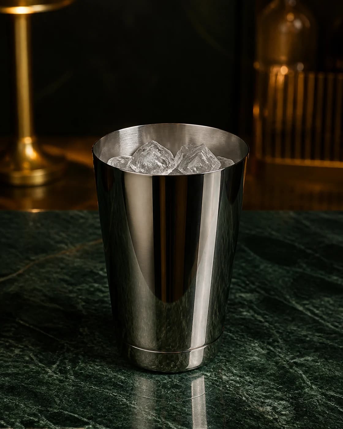 Measure the build stage with aged brass cocktail jigger