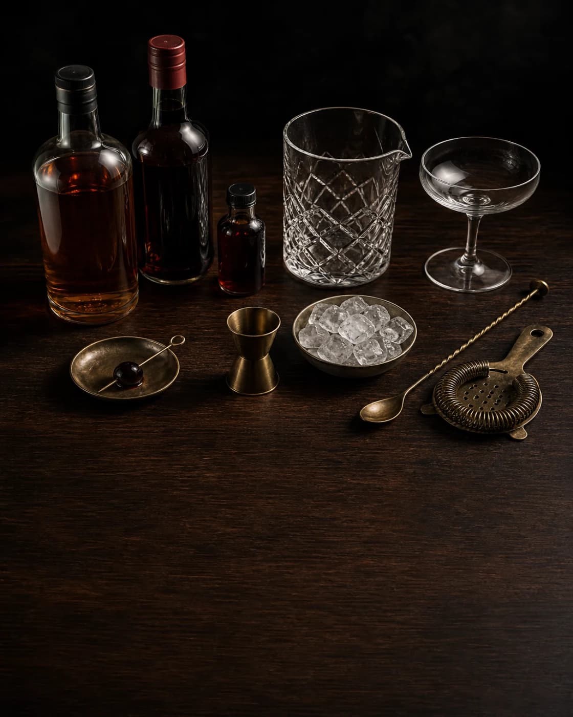 Overhead Manhattan station arranged on a dark walnut bar
