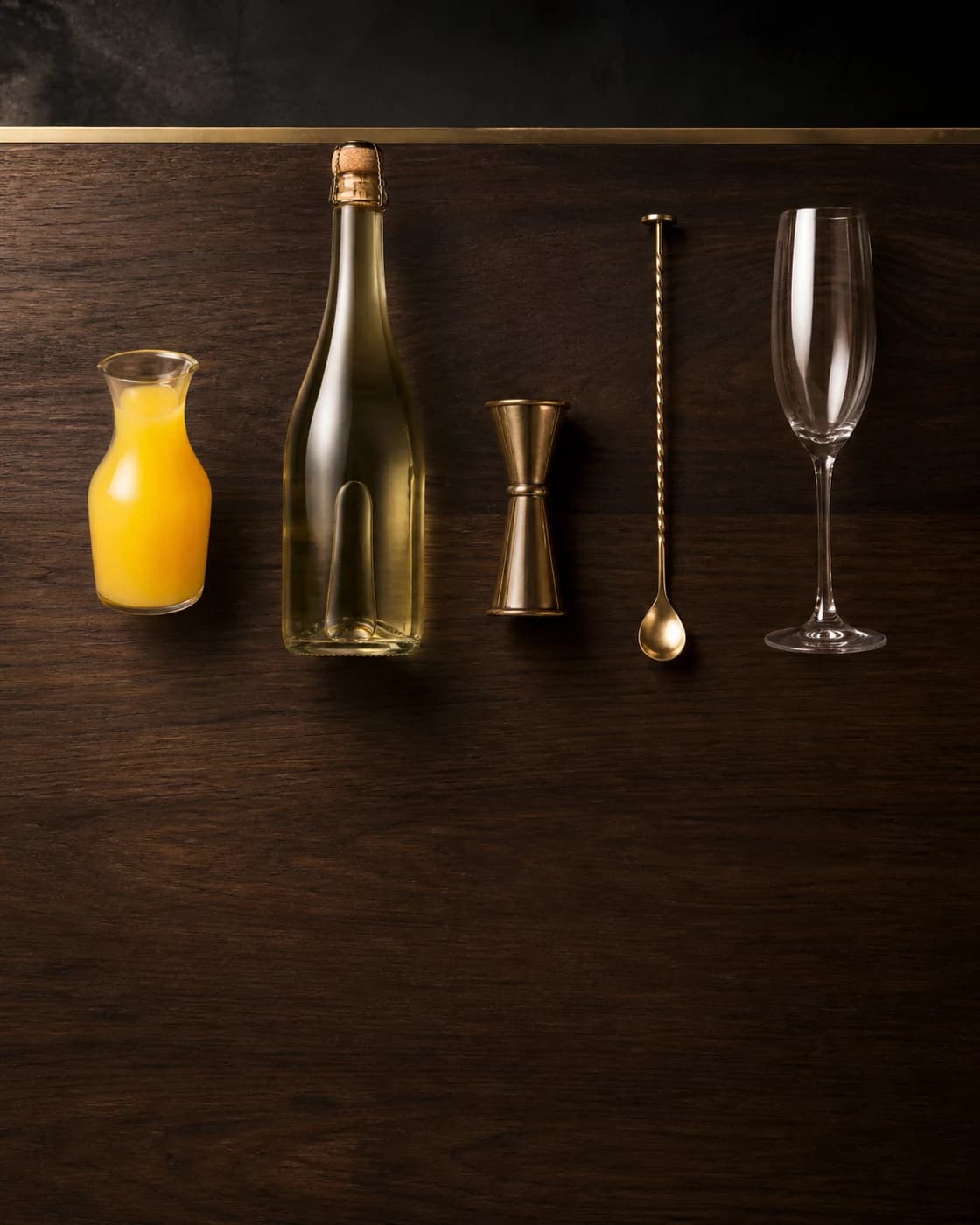 Overhead Mimosa station arranged on a dark walnut bar