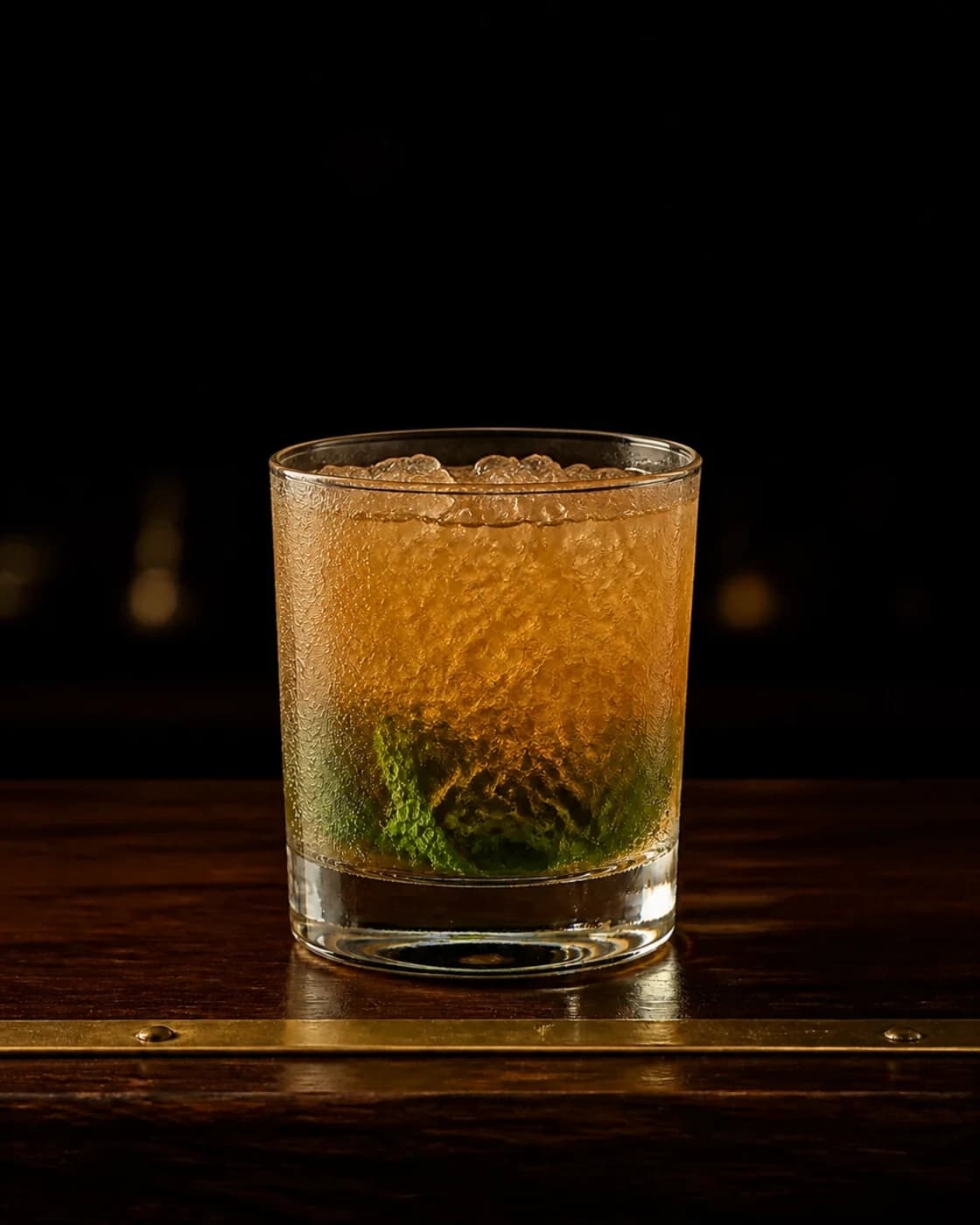 Crown with crushed ice stage with metal scoop filled with crushed ice