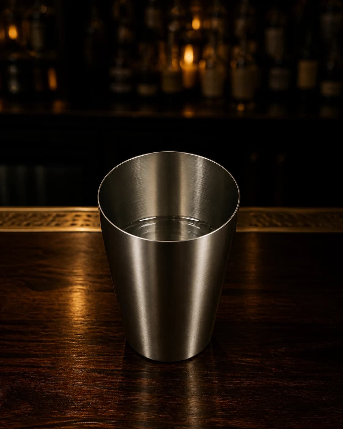 Add the lemon stage with aged brass cocktail jigger