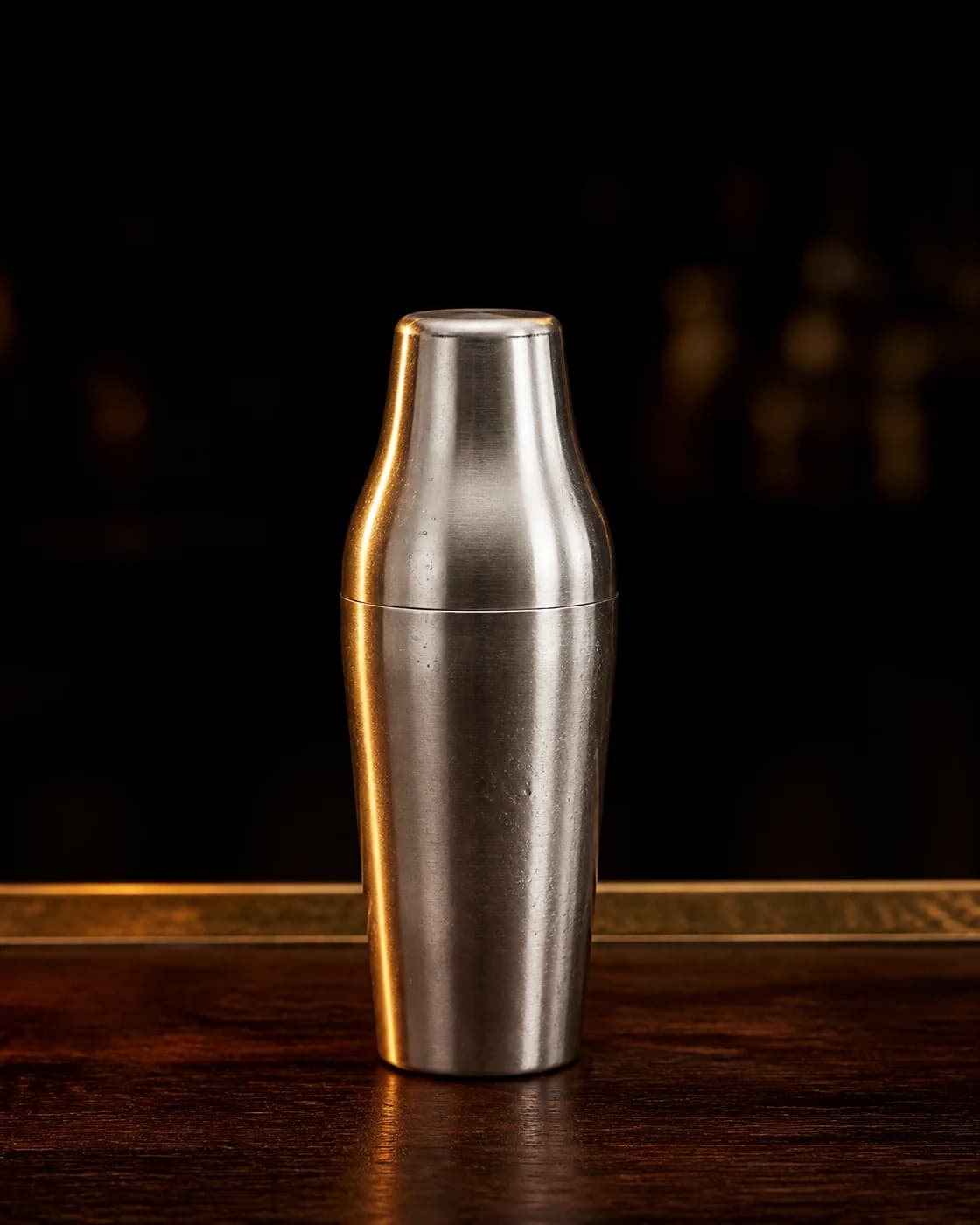 Shake hard stage with brushed metal cocktail shaker