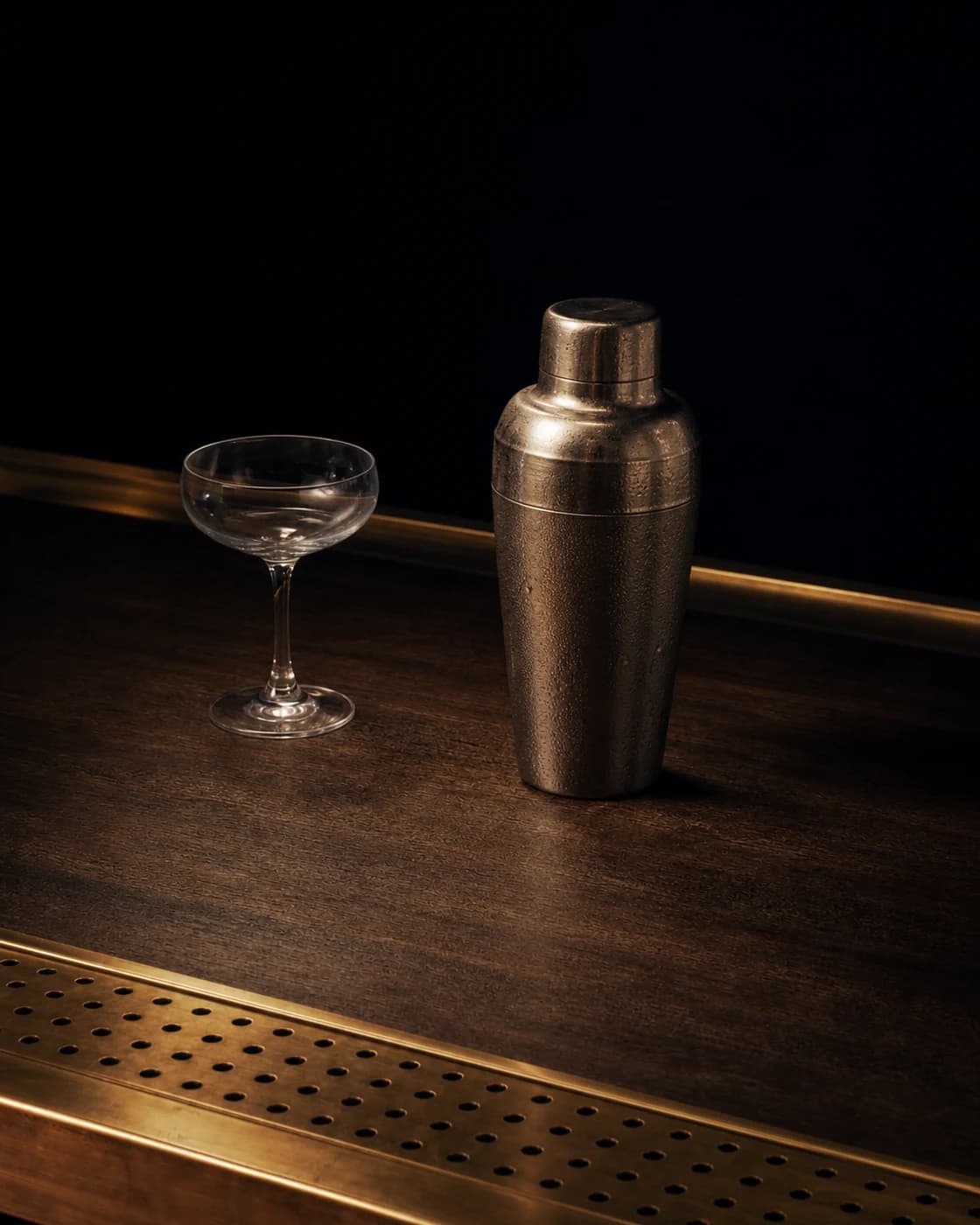 Shake until cold stage with aged brass cocktail shaker