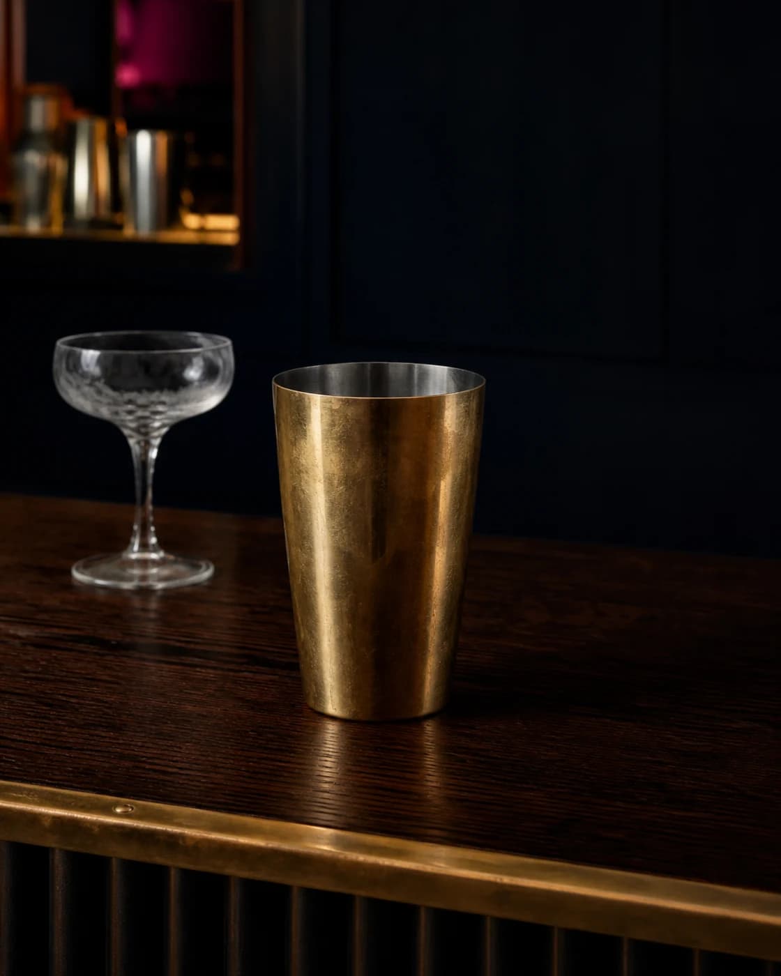 Measure the Cosmopolitan stage with aged brass cocktail jigger