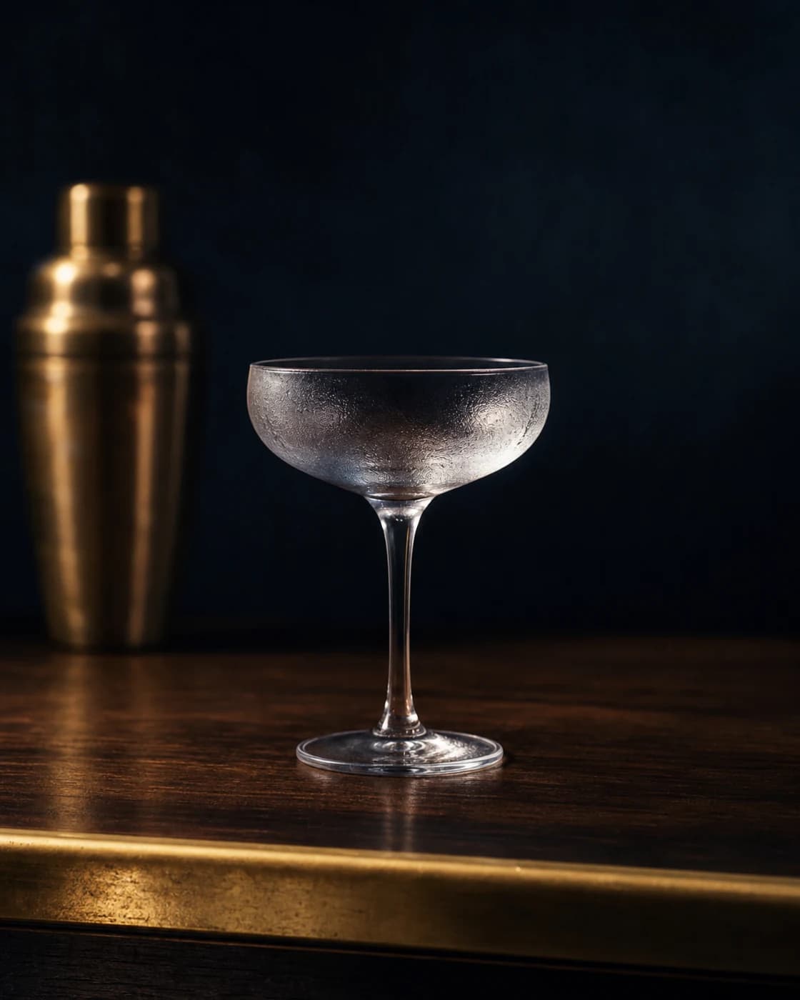 Fine strain stage with cocktail shaker fitted with a fine strainer