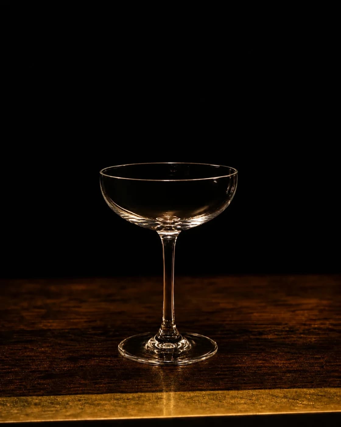 Fine strain stage with cocktail shaker fitted with a fine strainer